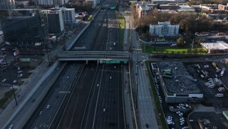 Camera-zooms-out-to-reveal-highway-junction-moving-traffic-in-downtown-Atlanta,-Georgia,-USA