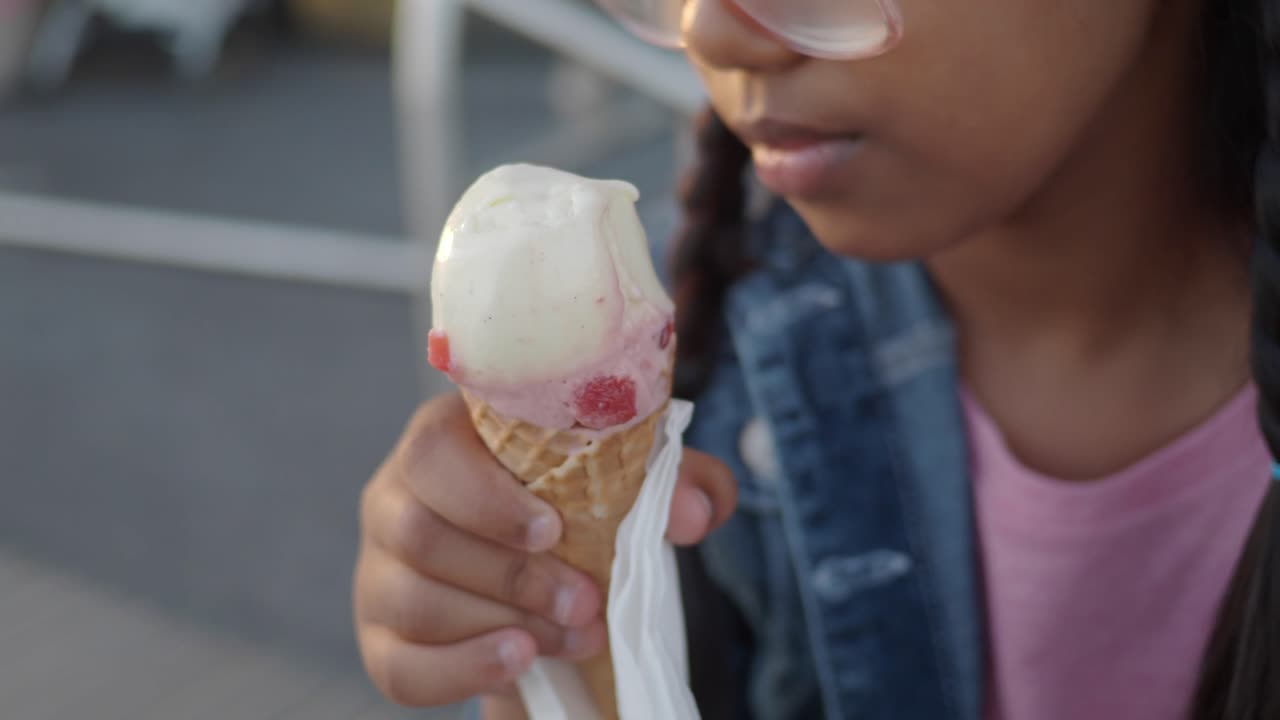 Girl eating ice cream cone
