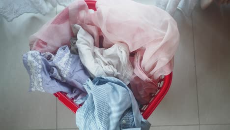 a laundry basket full of dirty clothes