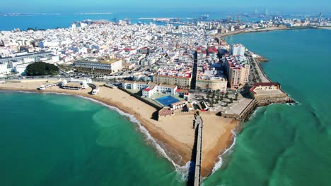 Aerial-view-of-the-white-city-and-coastline-of-Cadiz,-Spain