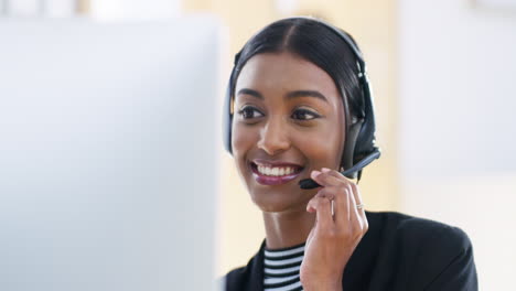 businesswoman with headset in office