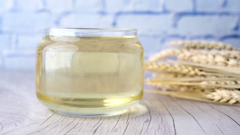 wheat cooking oil bottle on table