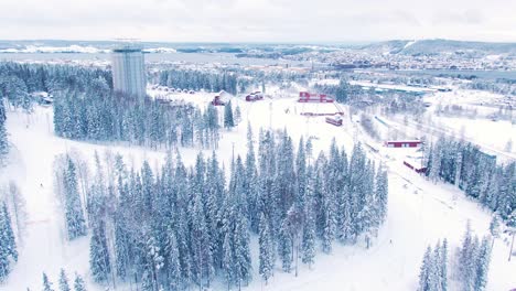 Aerial-bird's-eye-view-over-Östersund-skidstadion-on-winter-morning