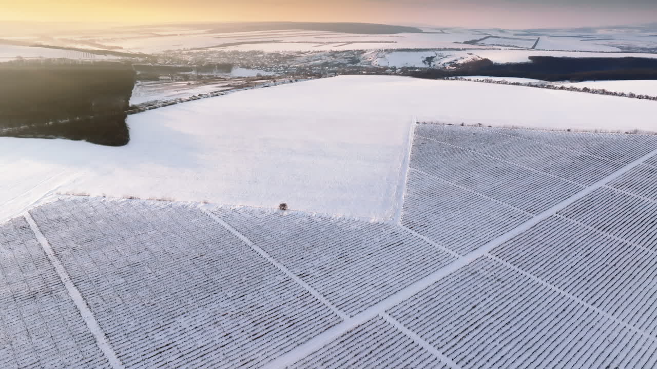 Aerial drone view of the Old Orhei covered in snow at sunrise. Fields during winter in Moldova