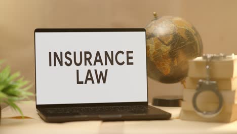 insurance law displayed in legal laptop screen