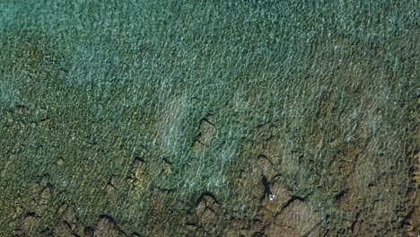 Top-down-drone-above-Blue-Lagoon-Veliki-Budikovac-Island,-Croatia