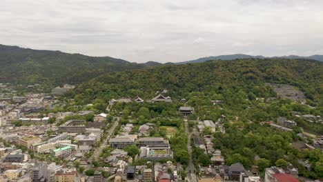 colorful wide aerial of kyoto with temples, mountains, and city skyline in kyoto, japan