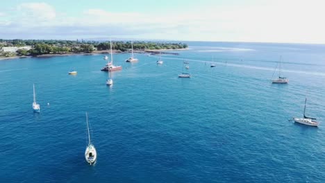 Panoramic-aerial-view-of-boats-in-ocean