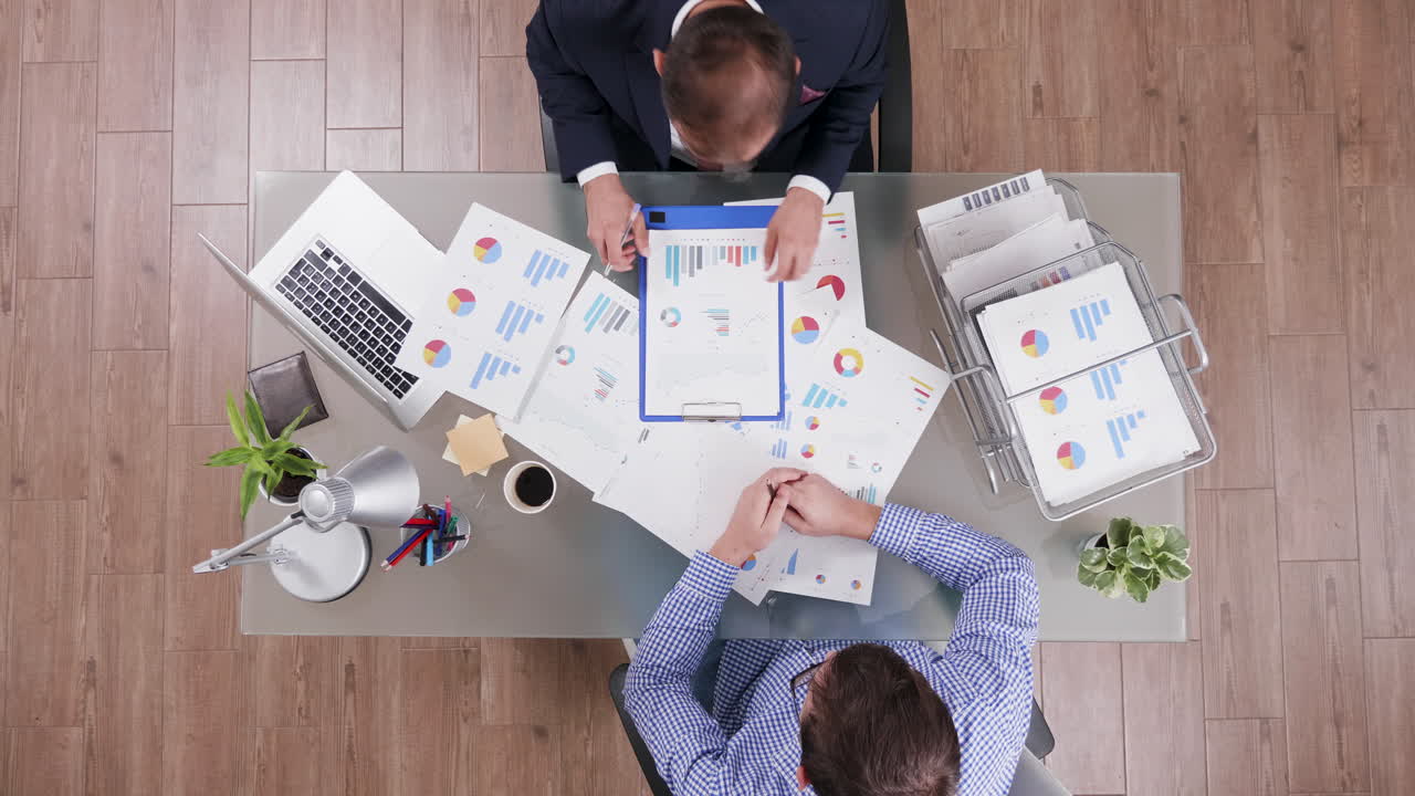 Business Meeting and Data Analysis in Office