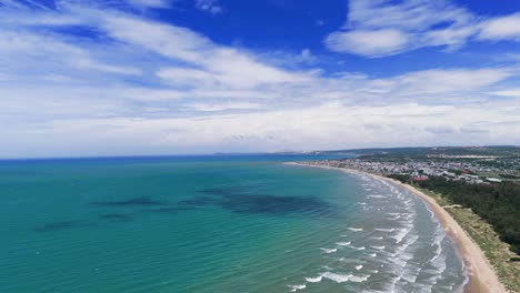 aerial view pan of the sea and the beach in lam dong