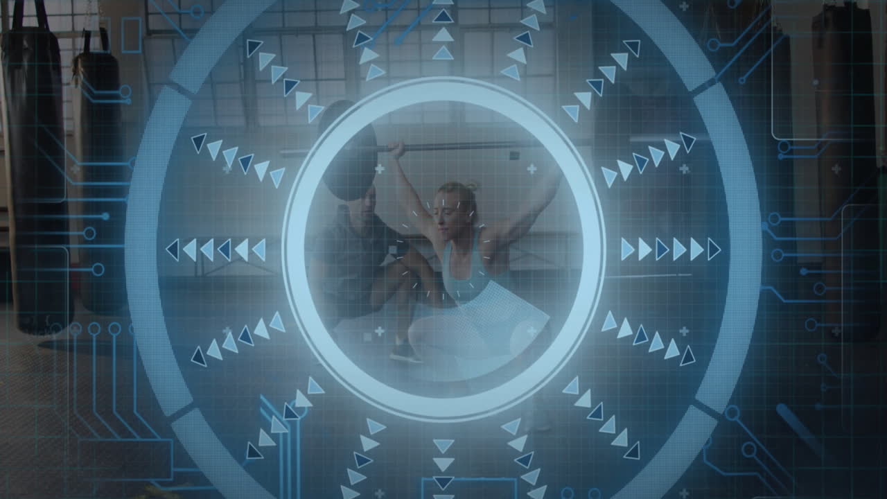 Performing in studio, dancers with digital geometric animation overlay, creating art