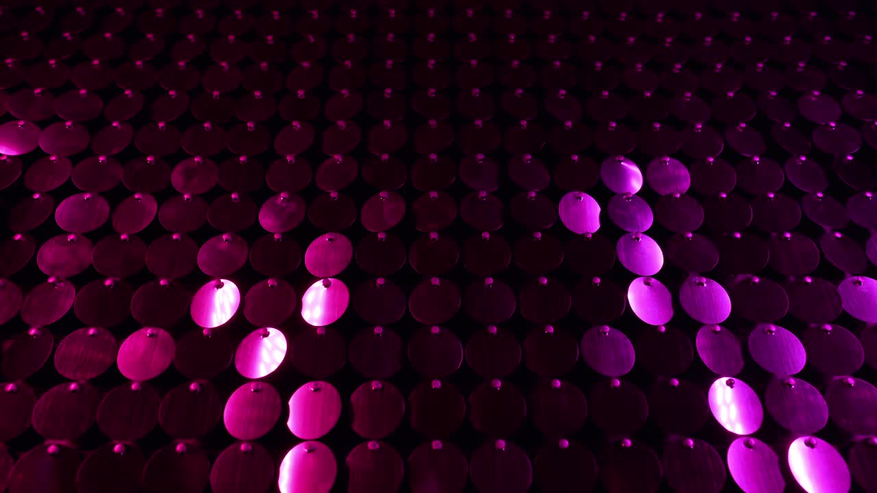 Pink or purple sequins sparkling reflective background. Abstract kinetic glitter wall moving. Night club decoration. Can be used as transitions, added to modern projects,art backgrounds.