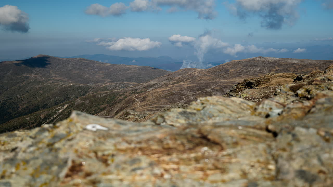 Dolly timelapse of Mountain landscape clouds moving slider sunny Day Kaimaktsalan