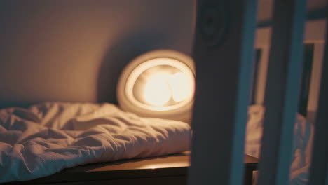 bedroom at night with lamp