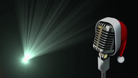 Animation-of-retro-microphone-with-santa-hat-over-green-spotlight