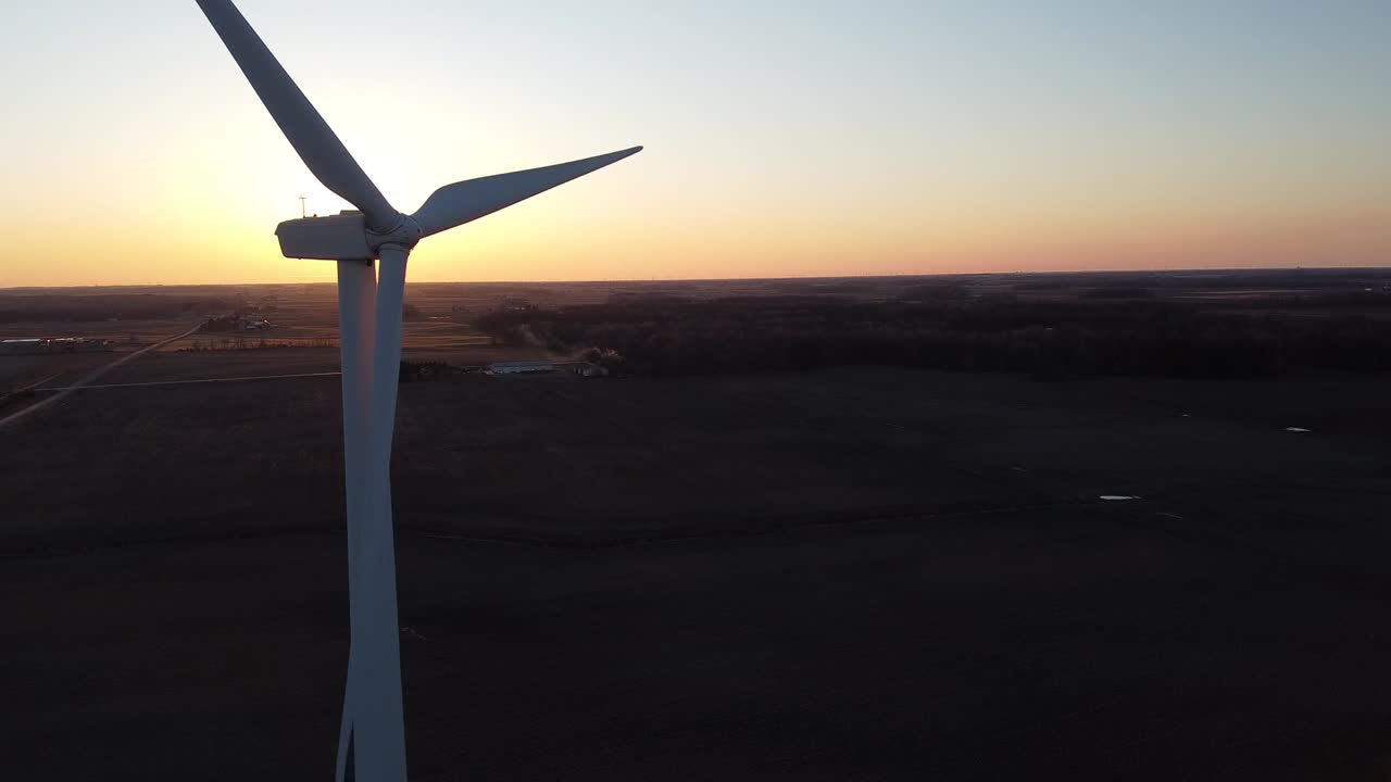The Michigan Wind Turbines Installed In The Farmland Near Ubly, Michigan During The Golden Hour.-medium shot