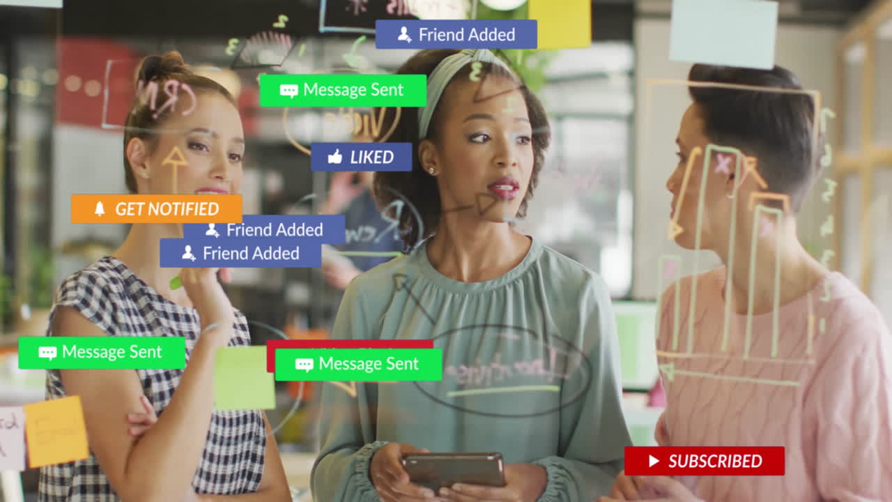 Three female colleagues brainstorming marketing ideas on glass board, with floating subscribe icons