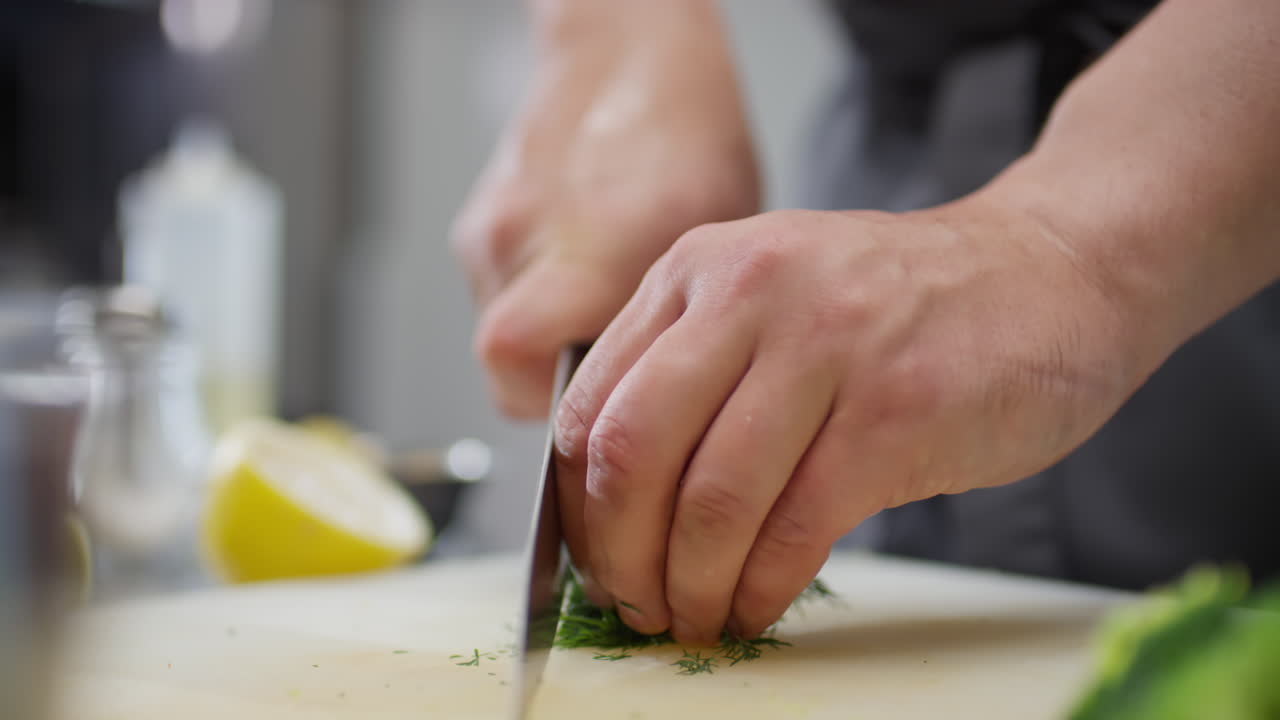 Chef Hands Cutting Fresh Dill