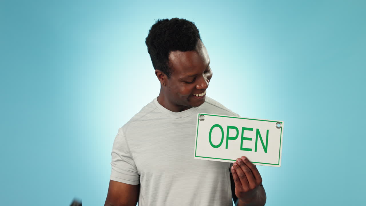 Happy black man, dumbbell and open sign for gym