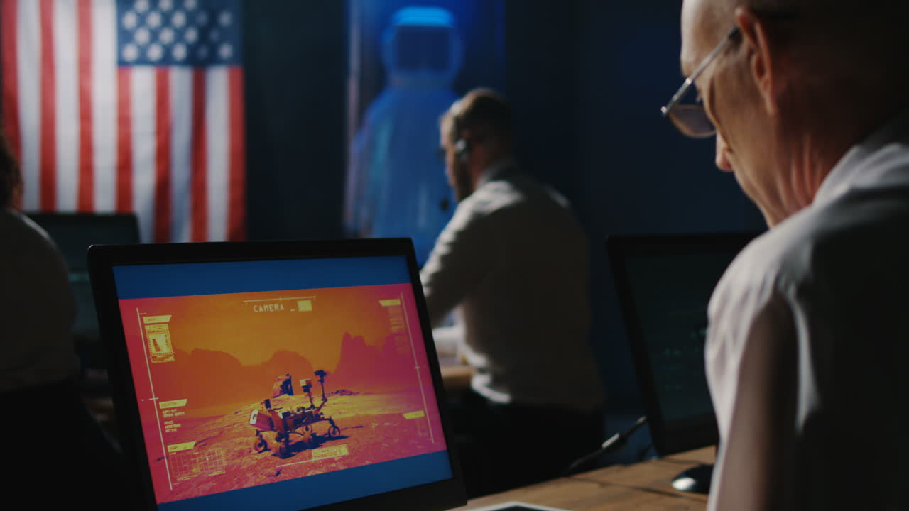 Mission Control Team Monitoring Mars Rover
