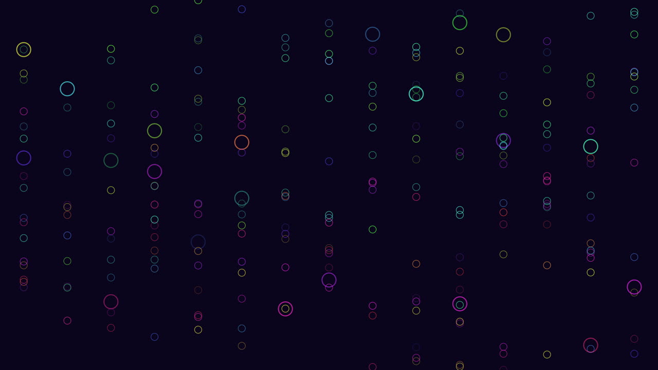 The image shows a clock-like pattern of colored dots on a black background. The dots form a circular shape with numbers, increasing in size clockwise