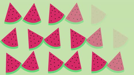 Animation-of-single-watermelons-floating-on-green-background