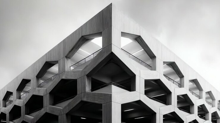 Explorando o design arquitetônico moderno por meio de padrões geométricos e simetria em duas imagens cativantes de uma estrutura contemporânea única