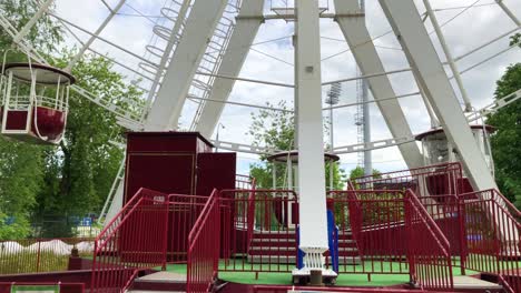 base with entrance of a moving ferris wheel in amusement park