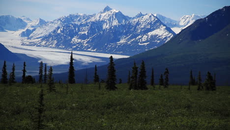 alaska glacier in the distance between mountains