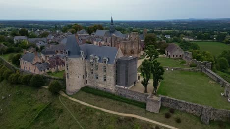 panoramic aerial movement around the medieval saint suzanne castle and belvedere, mayenne, france.