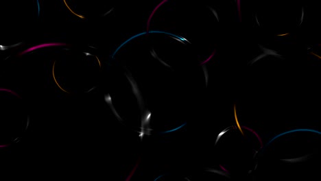 colorful glossy glowing rings on black background