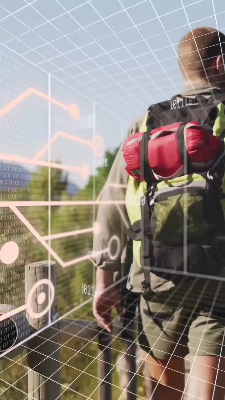 Video verticale: Escursionista uomo che cammina verso una ringhiera con un tablet che attiva una mappa in AR per osservare il panorama della valle.