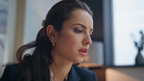 frowning director study report in modern office closeup. stressed woman working