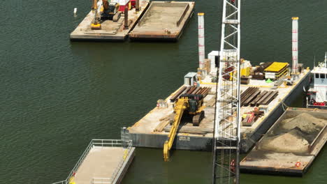 Excavator Dredger, Dredging Sand Under The Water In US Lock and Dam No