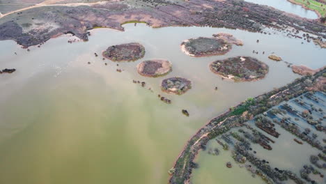 drone aerial scenic view of water mudflat river lake ecosystem mudflat agriculture farming industry coastline portugal europe 4k