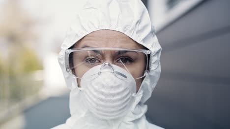 portrait of a worker in protective suit