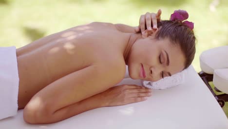 Lovely-young-woman-relaxing-at-a-spa