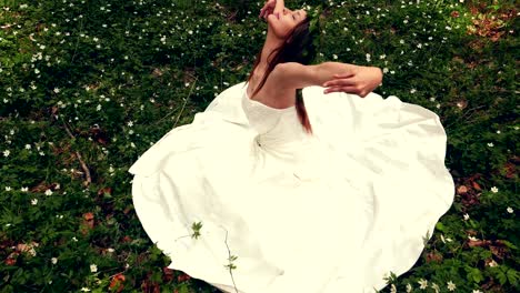the lady of the forest in a white garland goes to greet the spring.