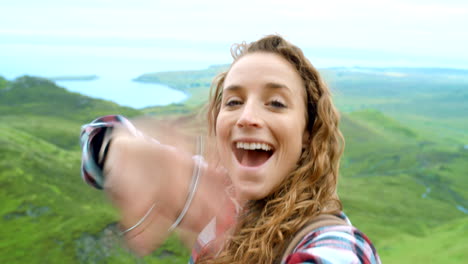 woman enjoying the scottish highlands