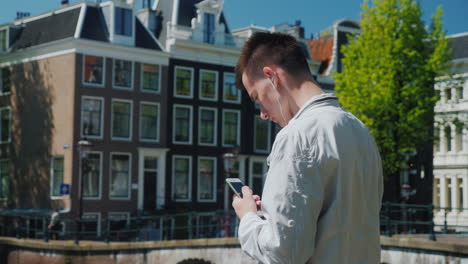 teenager listens to music in amsterdam