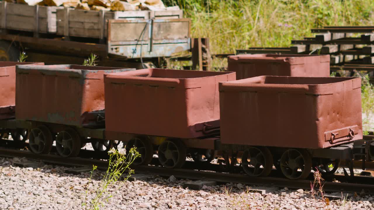 Mine Carts on Railroad Tracks