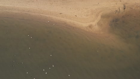 An-aerial-view-over-Coney-Island-Creek-by-Calvert-Vaux-Park-on-a-cold-winter-morning