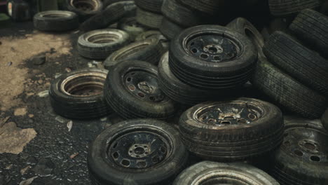 pile of old tires and wheels