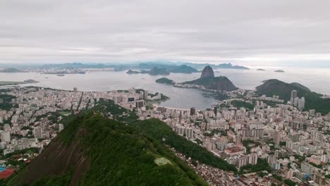 Panoramic-bird's-eye-view-of-Rio-de-Janeiro-on-a-cloudy-day-Brazil-beach-and-Botafogo-district-Sugar-Loaf-hill
