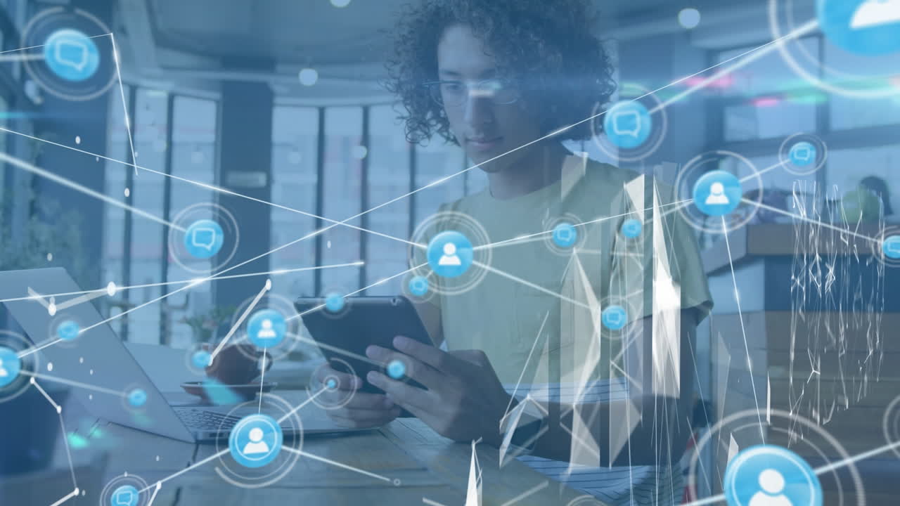 Animation of network of connections with icons over biracial man using tablet
