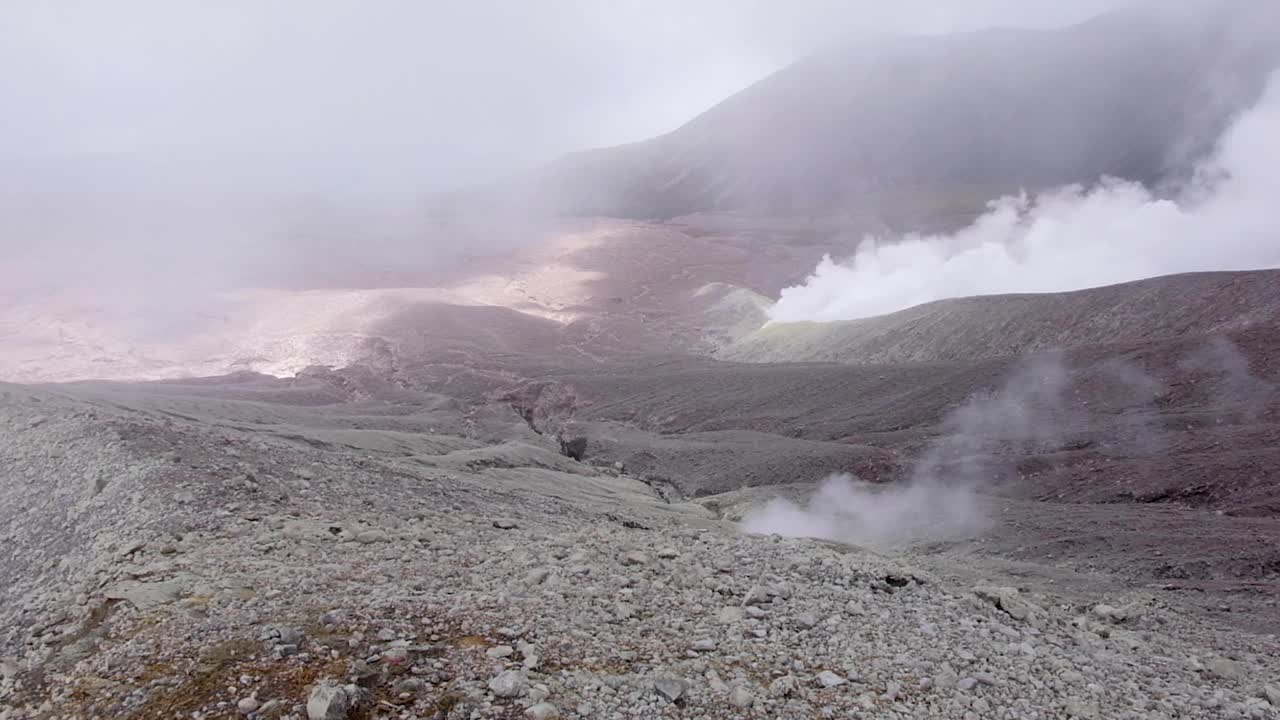 Unreal mars looking smoking volcanic terrain and landscape on Mt Balbi volcano in remote Bougainville, Papua New Guinea