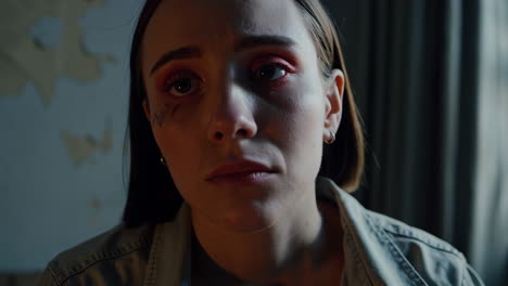 sad young woman in an old room