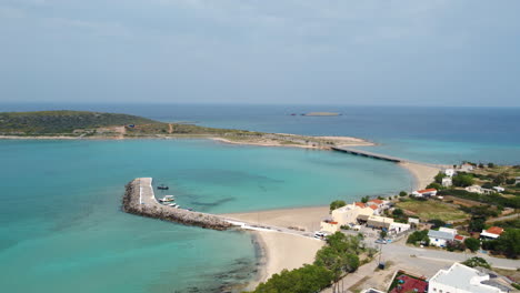 Aerial-view-of-Diakofti-town-and-surroundings-on-a-hot-summer-day-in-Kythera-island,-Greece,-Europe