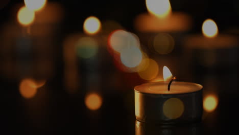 animación de velas de luz de té con manchas de luz parpadeantes