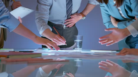 professional business people pointing and choosing idea of marketing data analysis or financial stock market profit statistic graph, bar at meeting room. in-depth analysis and collaborative discussion